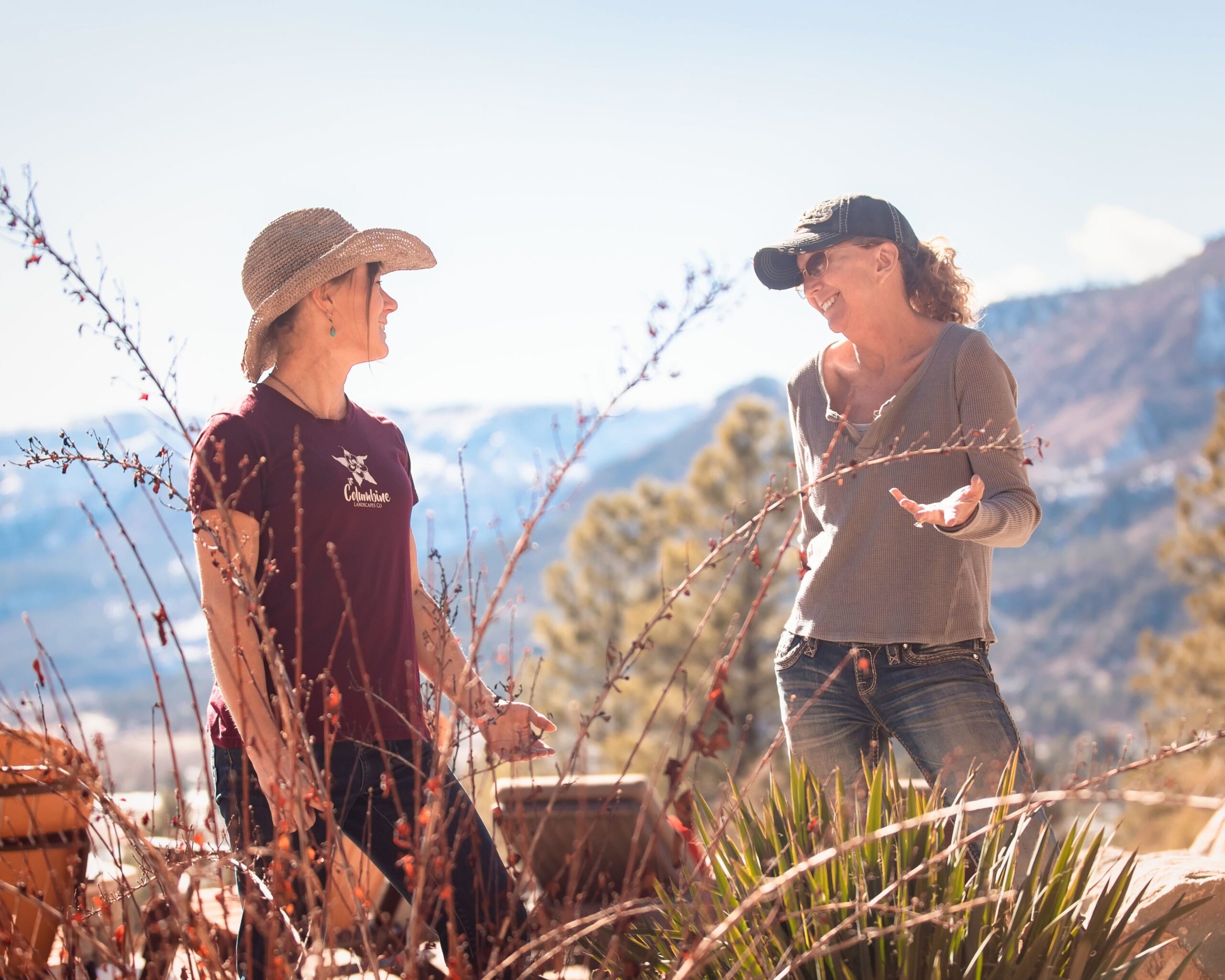 Columbine Landscapes designer on site, reading the land